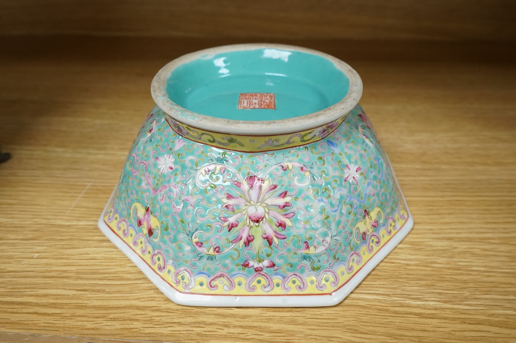 A Chinese enamelled porcelain turquoise ground hexagonal dish, Qianlong mark, late 19th century, 21cm in diameter